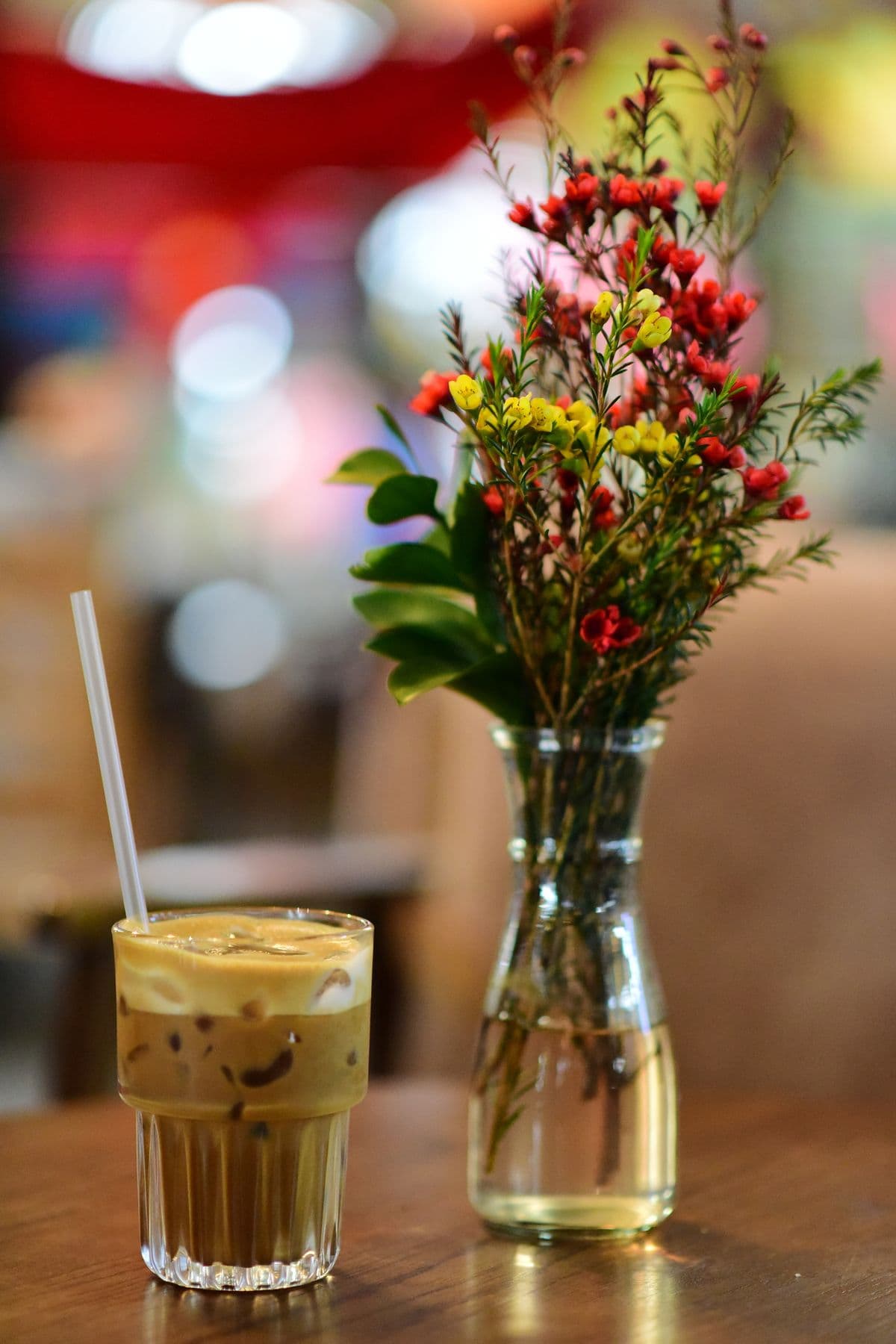 A glass of salted coffee with a rich cream foam layer over iced coffee